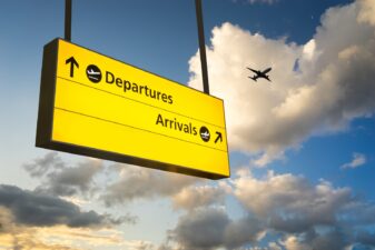 Departure & Arrival sign, representing selling and buying in a portfolio